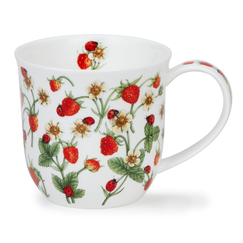 White mug with strawberry and ladybug pattern on a white background