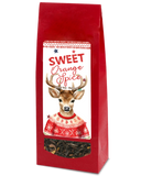 Red tea bag packaging with a cute deer illustration filled with 'Sweet Orange Spice' black tea.