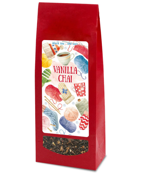 Red package of vanilla chai tea with colourful label on a white background