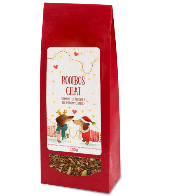 Rooibos Chai tea, 100g, in a red bag with two festive dachshunds on the label and a clear window showing the loose tea blend.