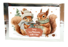 Tea greeting card in silver packaging with two squirrels in winter clothing and the message “Cozy Tea Moments FOR YOU!”