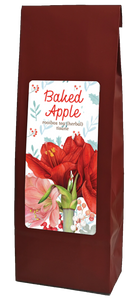 Red bag with a floral label filled with herbal tea 'Baked Apple'.