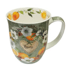 Mug with floral and fruit design on a white background