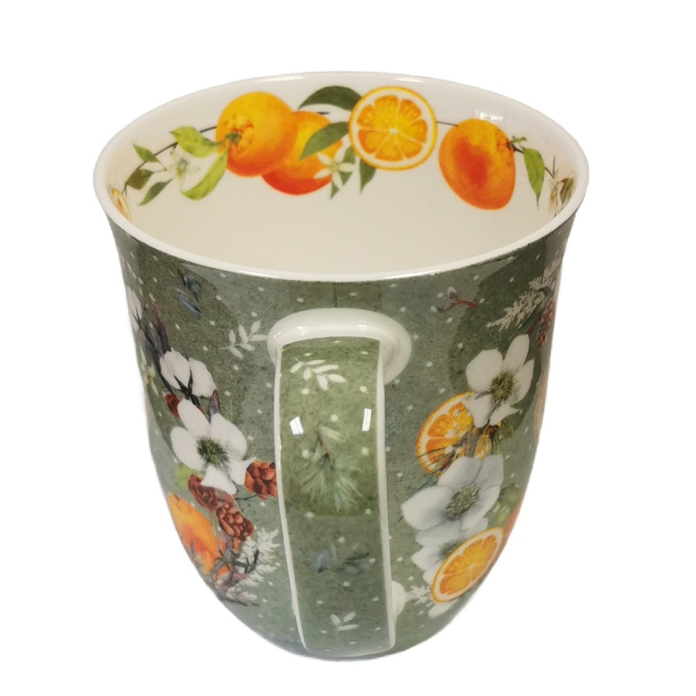 Decorative mug with orange and floral pattern on a white background