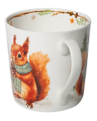 Side view of a white mug showing a red squirrel wearing a green scarf and holding a pine cone beside the handle.
