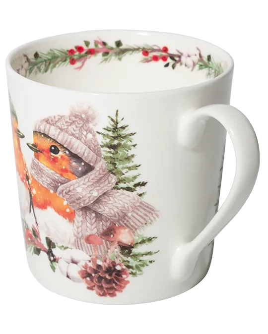 Side view of a white mug showing a robin in a mauve knitted hat and scarf beside an evergreen tree and pine cone, with the handle on the right.