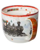 Side view of a Winter Express mug showing a black steam locomotive decorated with lights and a brick-patterned handle.