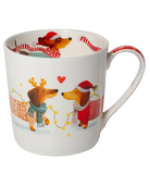 White mug featuring two dachshunds in festive knitwear, one with reindeer antlers and one in a Santa hat, surrounded by fairy lights.