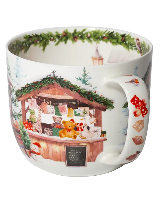 Side view of a snowy market mug showing a gift stall with teddy bears, hanging cards, and wrapped presents beside a decorated handle.
