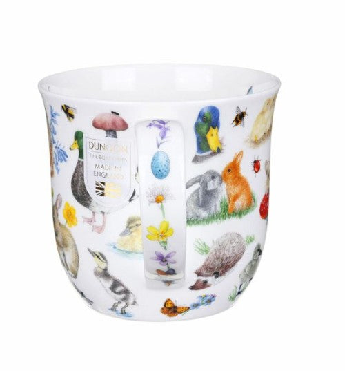 Fine bone china mug with animal and nature pattern on a white background