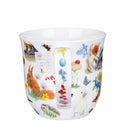 White mug with colourful animal illustrations on a white background