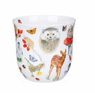 Fine bone China mug with nature-themed design featuring animals and plants on a white background