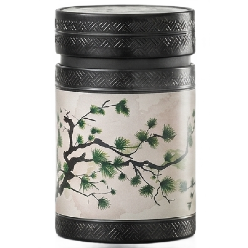 Akashi 150 g tea tin with green pine branches on a cream background, a black lid and textured black trim. 