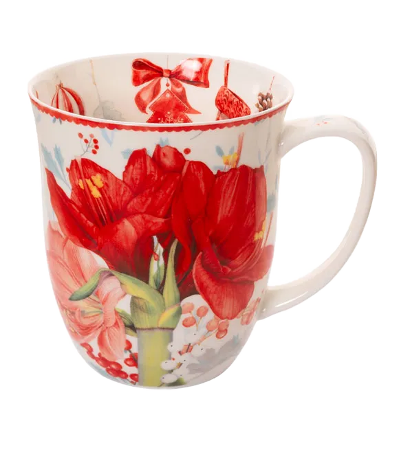 Mug with red floral and bow design on a white background
