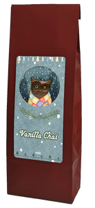 Vanilla Chai tea, 100g, in a burgundy bag with a snowy winter label featuring an owl wearing a colourful scarf.