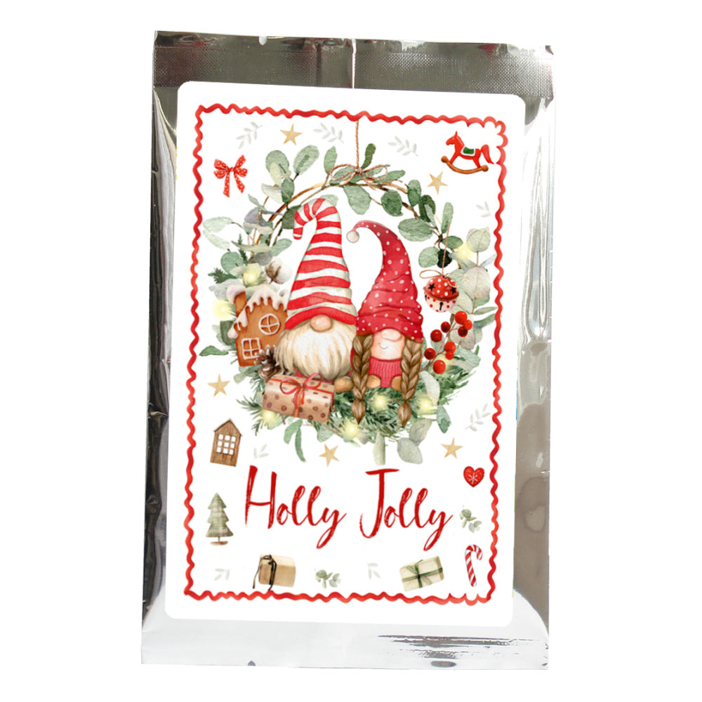 Packaged product with 'Holly Jolly' design featuring gnomes and winter elements.