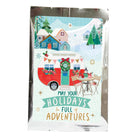Packaged product with a festive design featuring a camper, trees, and text on a white background.