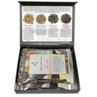 Tea box with bags of teas and a label on a white background