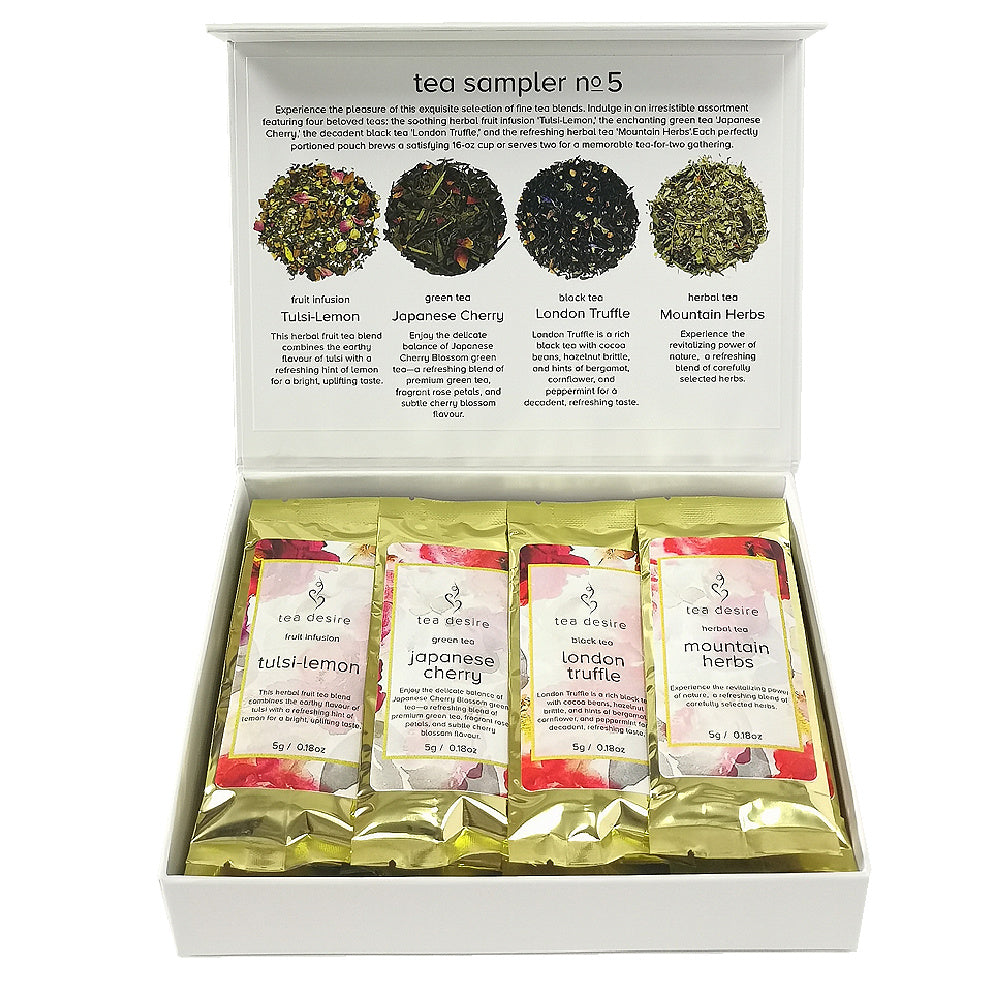 Tea sampler box with four different teas in gold coloured pouches