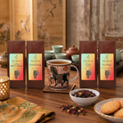 I’ll look at your bundle image and write concise alt text for it.

Tea Desire gift bundle with Ya Bao white tea, Oriental Beauty oolong, two pu-erh teas and a Year of the Horse mug on a wooden table.