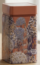 Decorative tin storage box with nature-themed design on a neutral background