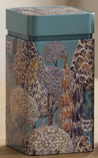 Decorative storage box with nature-themed design on a metal surface