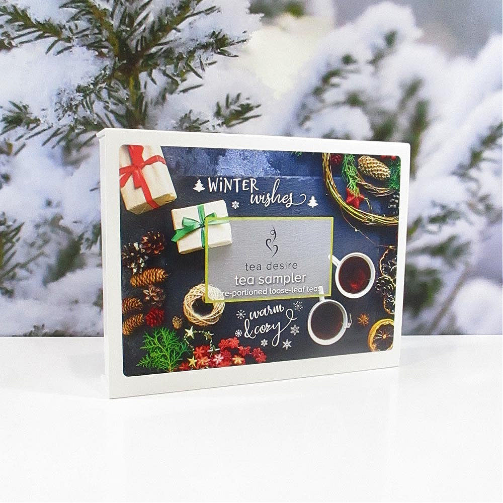 Tea sampler box with a winter-themed design featuring four different teas for a warm and cozy tea time.